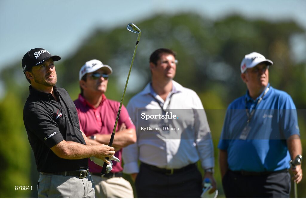 18 June 2014; Graeme McDowell watches his shot on the fifteenth fairway during the 2014 Irish Open Golf Championship Pro-Am. Fota Island, Cork. Picture credit: Diarmuid Greene / SPORTSFILE