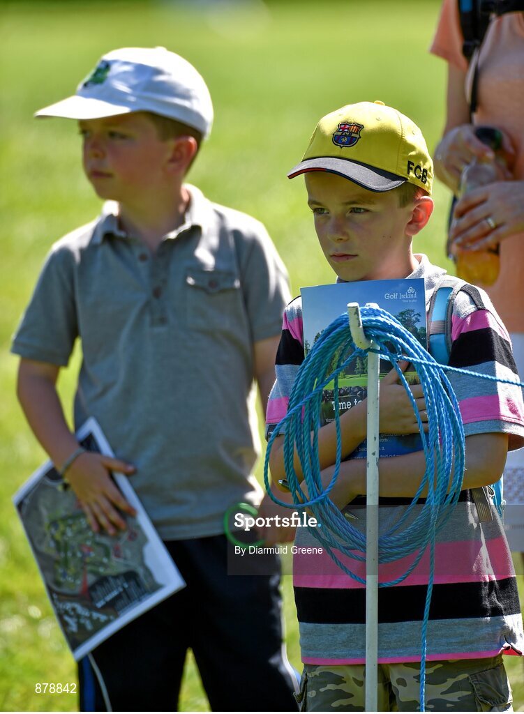 18 June 2014; The Loughnane brothers Ben, right, age 9, and Sean, age 7, from Castlemartyr, Co. Cork, watch Graeme McDowell on the fifteenth green during the 2014 Irish Open Golf Championship Pro-Am. Fota Island, Cork. Picture credit: Diarmuid Greene / SPORTSFILE