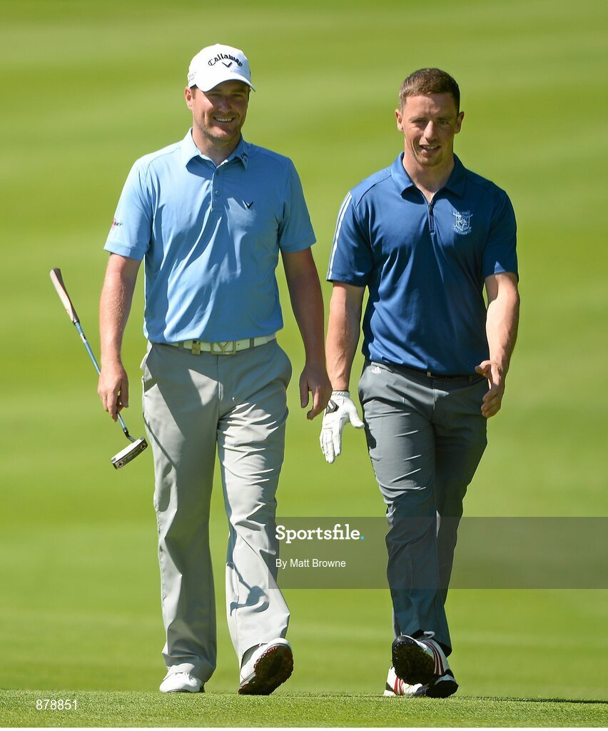 18 June 2014; European tour player Marc Warren, left, and Cork hurler Anthony Nash make their way upto the fifth green during the 2014 Irish Open Golf Championship Pro-Am. Fota Island, Cork. Picture credit: Matt Browne / SPORTSFILE