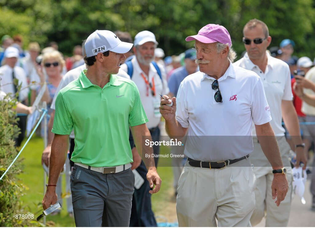 18 June 2014; Rory McIlroy in coversation with Dermot Desmond as they make their way to the second tee box during the 2014 Irish Open Golf Championship Pro-Am. Fota Island, Cork. Picture credit: Diarmuid Greene / SPORTSFILE