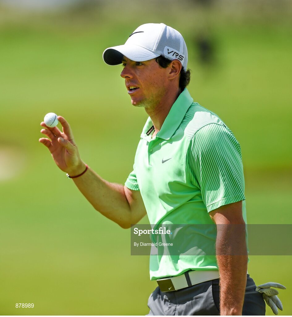 18 June 2014; Rory McIlroy ackowledges the crowd after putting on the seventh green during the 2014 Irish Open Golf Championship Pro-Am. Fota Island, Cork. Picture credit: Diarmuid Greene / SPORTSFILE