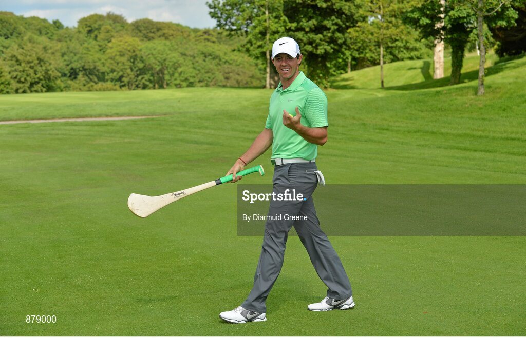 18 June 2014; Rory McIlroy practices his hurling skills on the 9th fairway during the 2014 Irish Open Golf Championship Pro-Am. Fota Island, Cork. Picture credit: Diarmuid Greene / SPORTSFILE