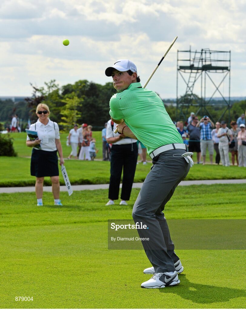 18 June 2014; Rory McIlroy hits a golf ball with a hurley on the 9th fairway during the 2014 Irish Open Golf Championship Pro-Am. Fota Island, Cork. Picture credit: Diarmuid Greene / SPORTSFILE