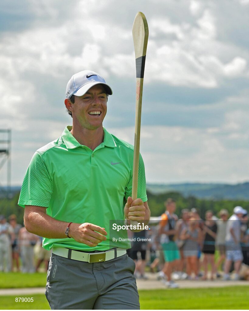 18 June 2014; Rory McIlroy practices his hurling skills on the 9th fairway during the 2014 Irish Open Golf Championship Pro-Am. Fota Island, Cork. Picture credit: Diarmuid Greene / SPORTSFILE
