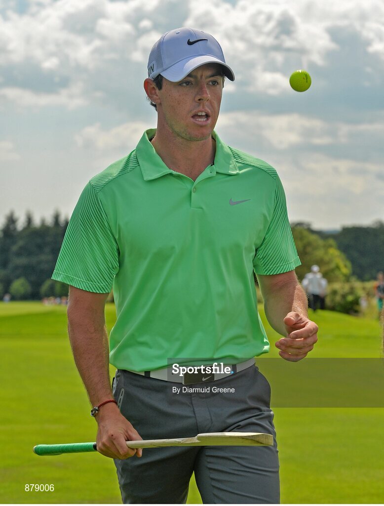 18 June 2014; Rory McIlroy practices his hurling skills on the 9th fairway during the 2014 Irish Open Golf Championship Pro-Am. Fota Island, Cork. Picture credit: Diarmuid Greene / SPORTSFILE