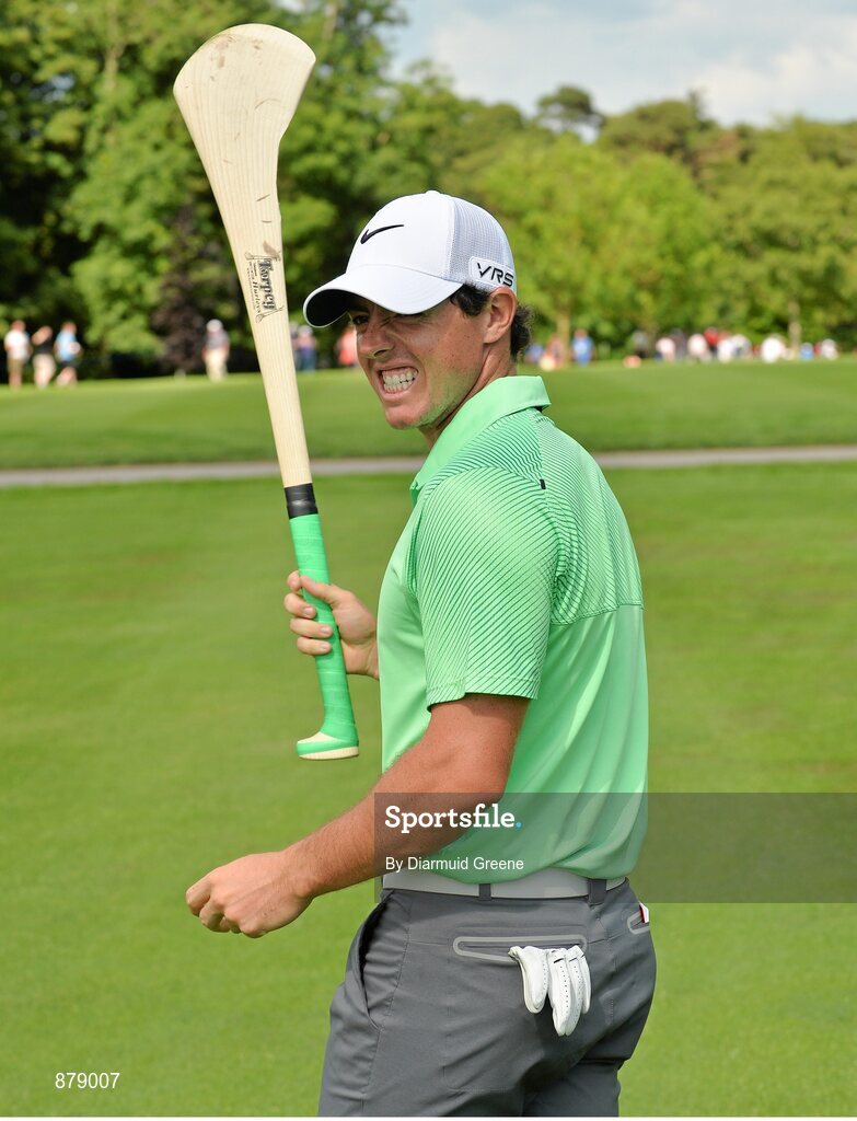 18 June 2014; Rory McIlroy practices his hurling skills on the 9th fairway during the 2014 Irish Open Golf Championship Pro-Am. Fota Island, Cork. Picture credit: Diarmuid Greene / SPORTSFILE