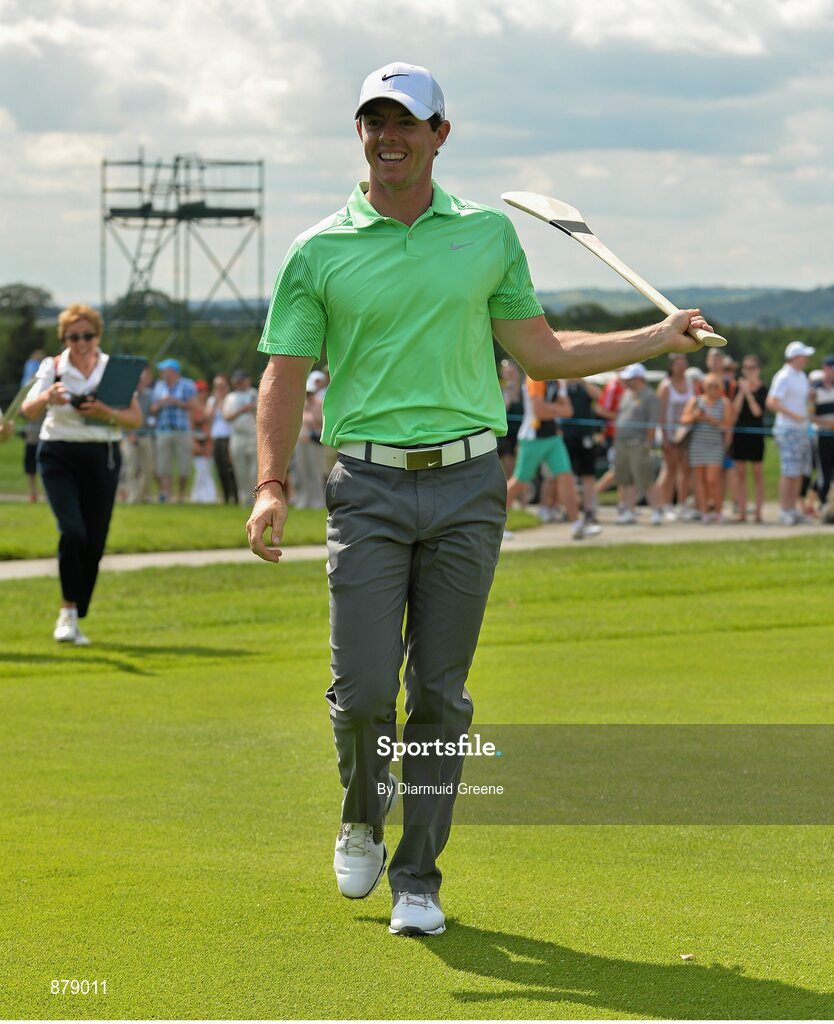 18 June 2014; Rory McIlroy after hitting a golf ball with a hurley on the 9th fairway during the 2014 Irish Open Golf Championship Pro-Am. Fota Island, Cork. Picture credit: Diarmuid Greene / SPORTSFILE
