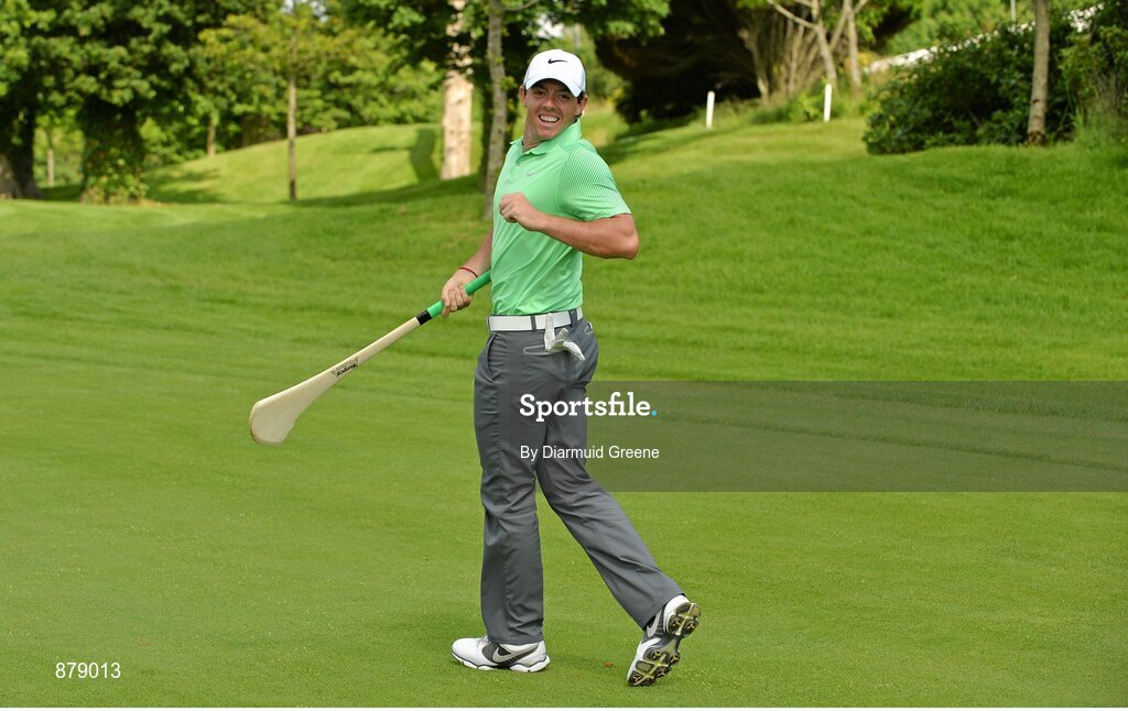18 June 2014; Rory McIlroy practices his hurling skills on the 9th fairway during the 2014 Irish Open Golf Championship Pro-Am. Fota Island, Cork. Picture credit: Diarmuid Greene / SPORTSFILE