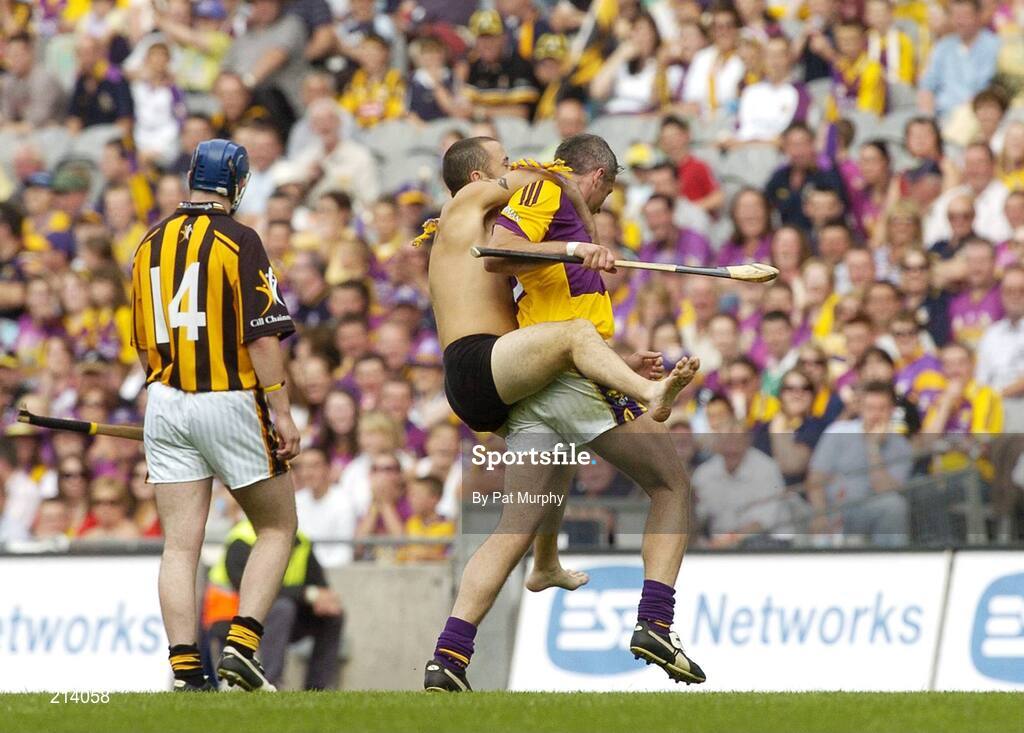 2 July 2006; A streaker jumps on Wexford's Declan Ruth. Guinness Leinster Senior Hurling Championship Final, Wexford v Kilkenny, Croke Park, Dublin. Picture credit: Pat Murphy / SPORTSFILE