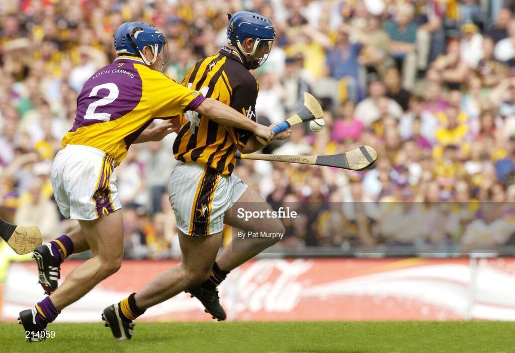 2 July 2006; Eoin Larkin, Kilkenny, in action against Malachy Travers, Wexford. Guinness Leinster Senior Hurling Championship Final, Wexford v Kilkenny, Croke Park, Dublin. Picture credit: Pat Murphy / SPORTSFILE