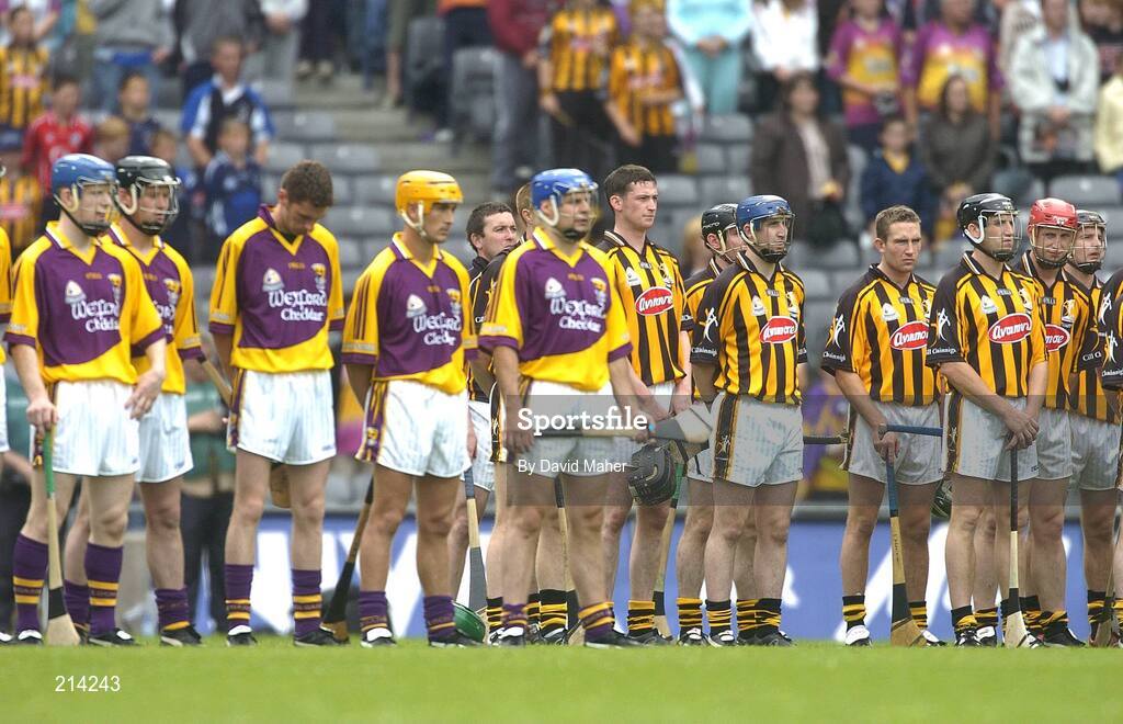 2 July 2006; Kilkenny and Wexford players stand for the National Anthem before the start of the game. Guinness Leinster Senior Hurling Championship Final, Wexford v Kilkenny, Croke Park, Dublin. Picture credit: David Maher / SPORTSFILE