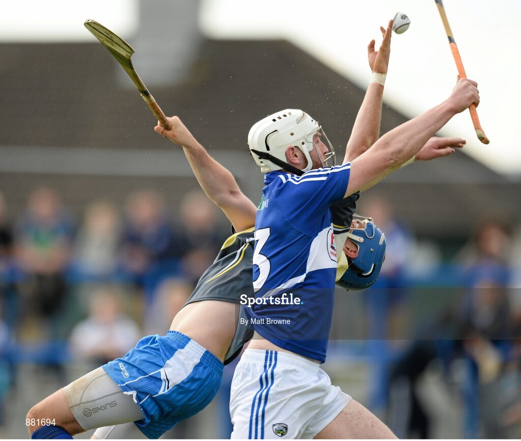 28 June 2014; Neil Foyle, Laois, goes up for the ball with Waterford goalkeeper Stephen O'Keeffe before scoring the first goal. GAA Hurling All-Ireland Senior Championship, Round 1, Waterford v Laois, Walsh Park, Waterford. Picture credit: Matt Browne / SPORTSFILE