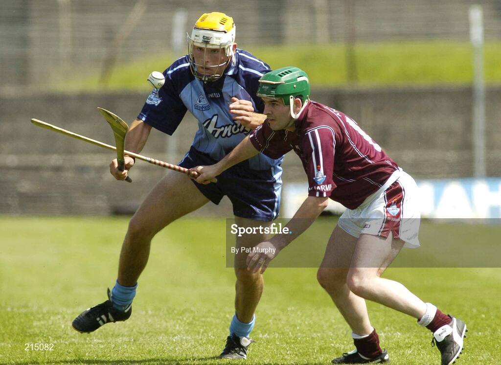 15 July 2006; David Curtin, Dublin, in action against Pat Clarke, Westmeath. Guinness Senior Hurling Championship, Relegation Final, Dublin v Westmeath, O'Connor Park, Tullamore, Co. Offaly. Picture credit: Pat Murphy / SPORTSFILE