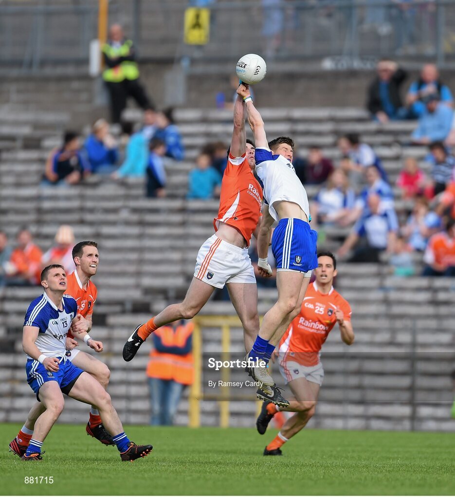 28 June 2014; Aaron Findon, Armagh, in action against Darren Hughes, Monaghan. Ulster GAA Football Senior Championship, Semi-Final, Armagh v Monaghan, St Tiernach's Park, Clones, Co. Monaghan. Picture credit: Ramsey Cardy / SPORTSFILE