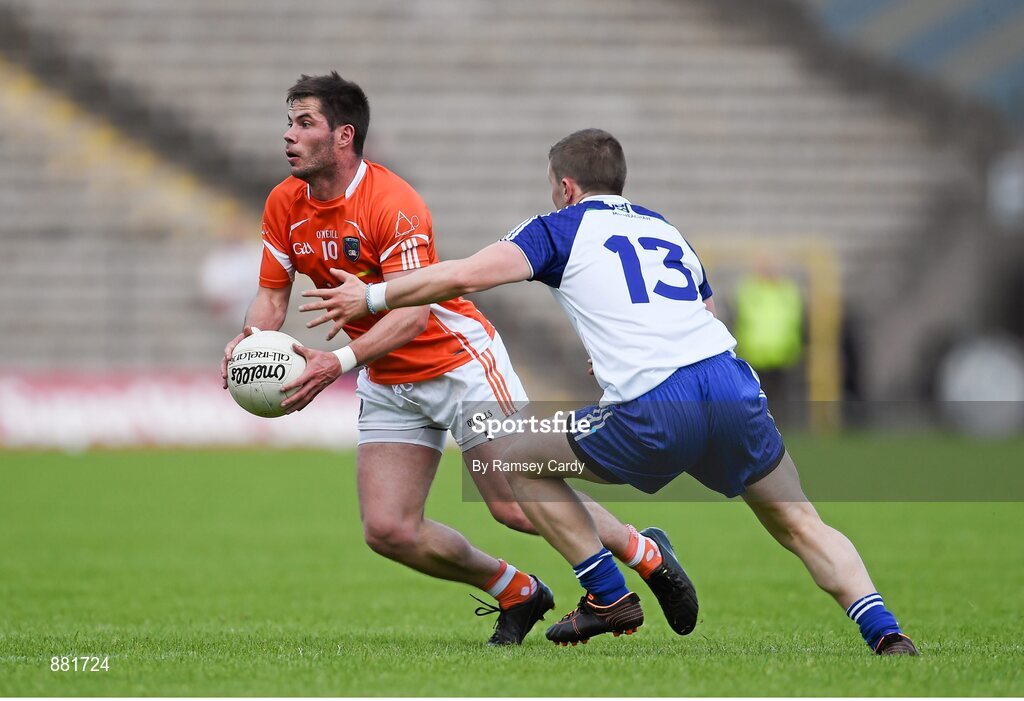 28 June 2014; Eugene McVerry, Armagh, in action against Dermot Malone, Monaghan. Ulster GAA Football Senior Championship, Semi-Final, Armagh v Monaghan, St Tiernach's Park, Clones, Co. Monaghan. Picture credit: Ramsey Cardy / SPORTSFILE