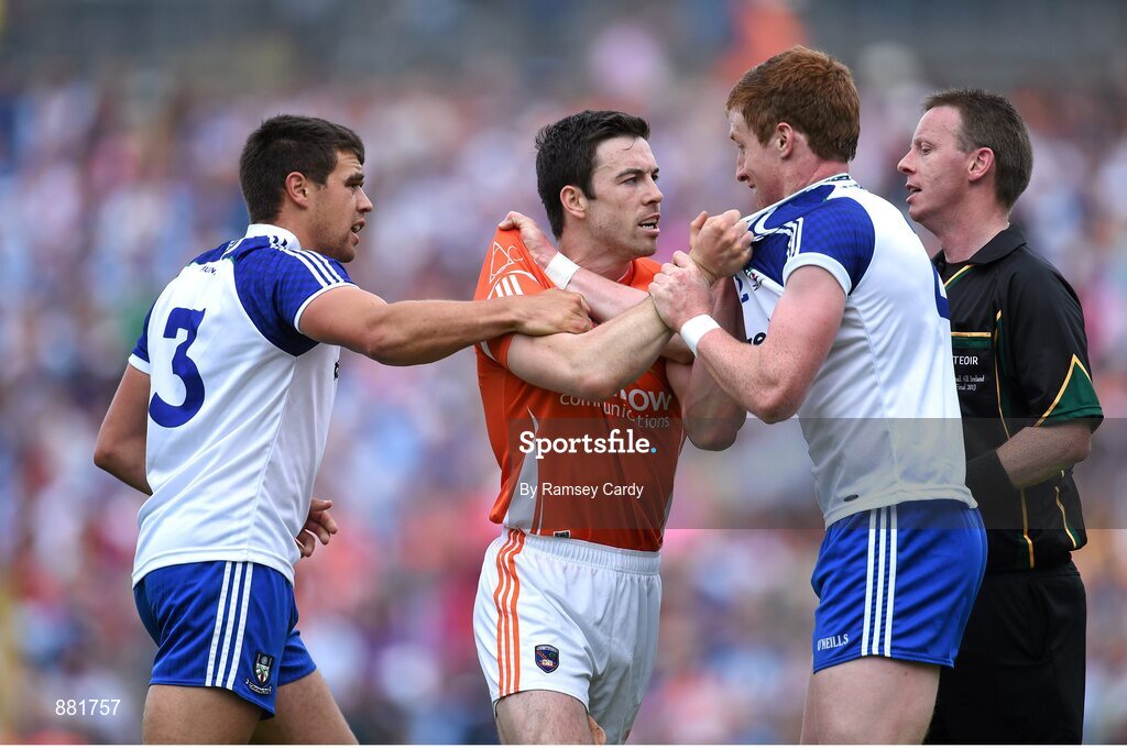 28 June 2014; Armagh's Aidan Forker and Monaghan's Padraig Donaghy during an altercation in the first half. Ulster GAA Football Senior Championship, Semi-Final, Armagh v Monaghan, St Tiernach's Park, Clones, Co. Monaghan. Picture credit: Ramsey Cardy / SPORTSFILE