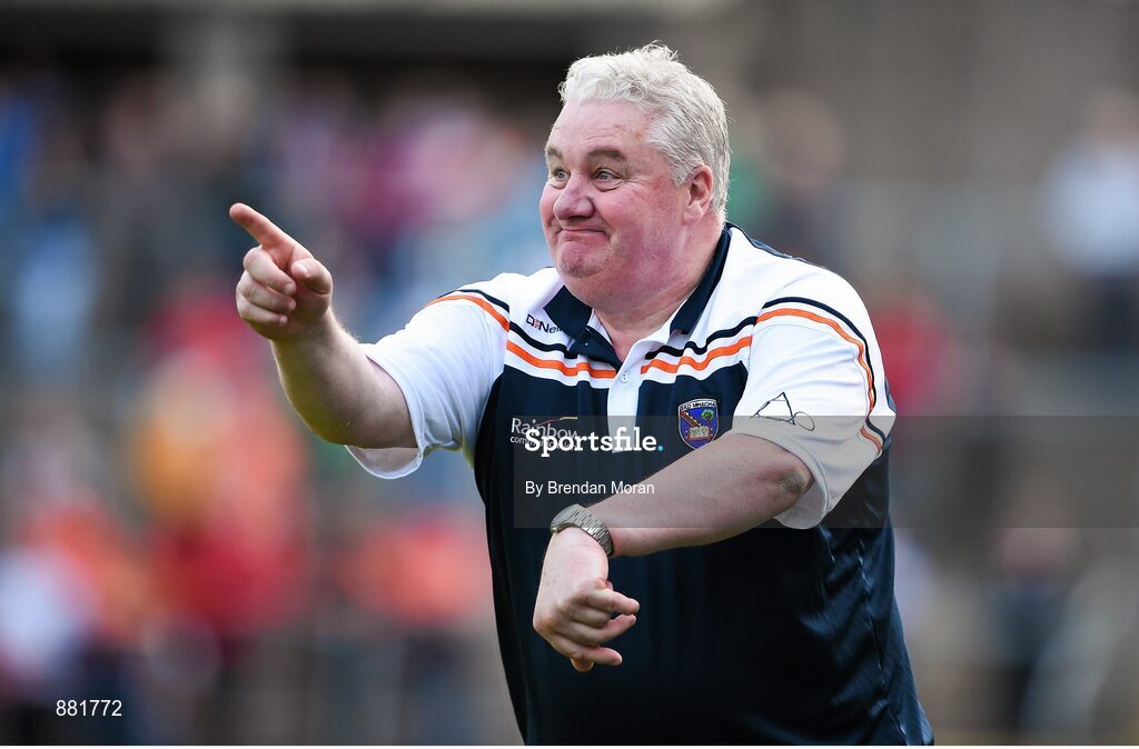 28 June 2014; Armagh manager Paul Grimley argues about the amount of time in the final minutes of the game. Ulster GAA Football Senior Championship, Semi-Final, Armagh v Monaghan, St Tiernach's Park, Clones, Co. Monaghan. Picture credit: Brendan Moran / SPORTSFILE