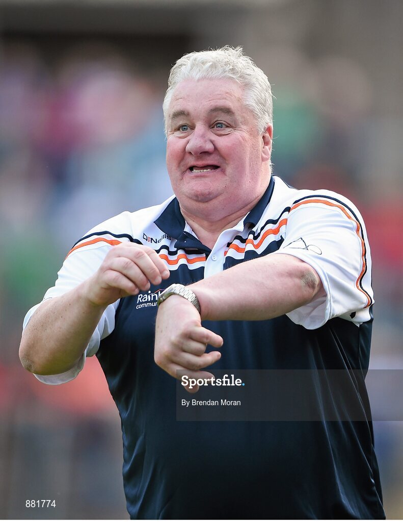 28 June 2014; Armagh manager Paul Grimley argues about the amount of time in the final minutes of the game. Ulster GAA Football Senior Championship, Semi-Final, Armagh v Monaghan, St Tiernach's Park, Clones, Co. Monaghan. Picture credit: Brendan Moran / SPORTSFILE