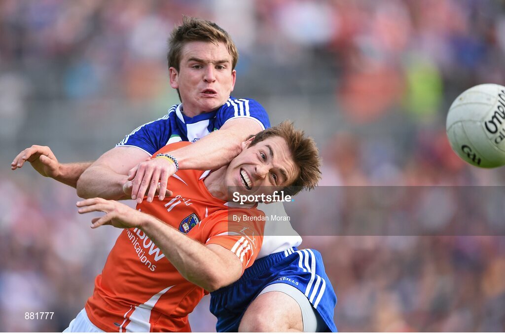 28 June 2014; Kevin Dyas, Armagh, in action against Dessie Mone, Monaghan. Ulster GAA Football Senior Championship, Semi-Final, Armagh v Monaghan, St Tiernach's Park, Clones, Co. Monaghan. Picture credit: Brendan Moran / SPORTSFILE