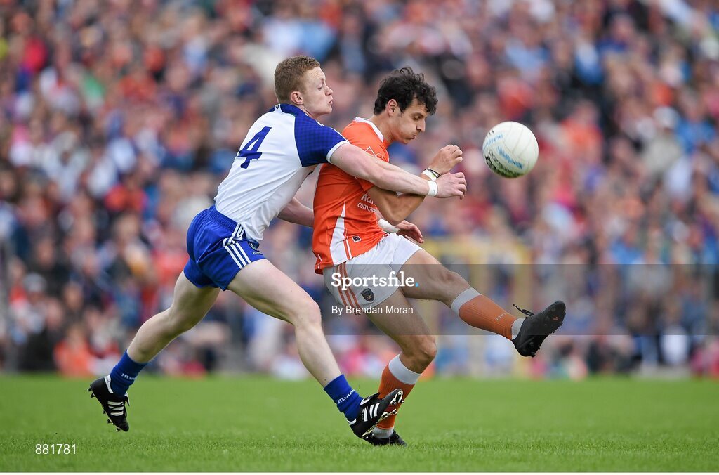28 June 2014; Jamie Clarke, Armagh, is tackled by Colin Walshe, Monaghan. Ulster GAA Football Senior Championship, Semi-Final, Armagh v Monaghan, St Tiernach's Park, Clones, Co. Monaghan. Picture credit: Brendan Moran / SPORTSFILE