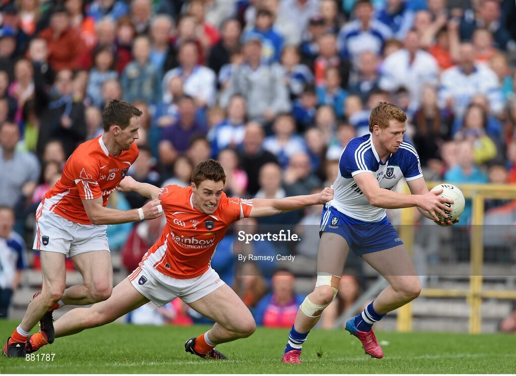 28 June 2014; Kieran Hughes, Monaghan, in action against Finnian Moriarty, left, and Charlie Vernon, Armagh. Ulster GAA Football Senior Championship, Semi-Final, Armagh v Monaghan, St Tiernach's Park, Clones, Co. Monaghan. Picture credit: Ramsey Cardy / SPORTSFILE