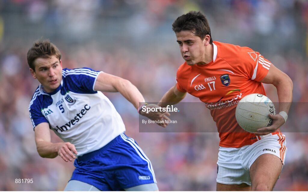 28 June 2014; Stefan Campbell, Armagh, holds off the challenge of Dessie Mone, Monaghan. Ulster GAA Football Senior Championship, Semi-Final, Armagh v Monaghan, St Tiernach's Park, Clones, Co. Monaghan. Picture credit: Brendan Moran / SPORTSFILE