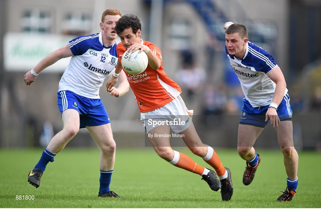 28 June 2014; Jamie Clarke, Armagh, in action against Paudie McKenna, left, and Dermot Malone, Monaghan. Ulster GAA Football Senior Championship, Semi-Final, Armagh v Monaghan, St Tiernach's Park, Clones, Co. Monaghan. Picture credit: Brendan Moran / SPORTSFILE