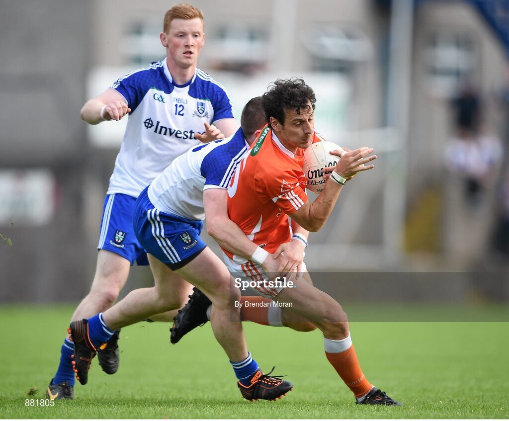 28 June 2014; Jamie Clarke, Armagh, is tackled by Dermot Malone, Monaghan. Ulster GAA Football Senior Championship, Semi-Final, Armagh v Monaghan, St Tiernach's Park, Clones, Co. Monaghan. Picture credit: Brendan Moran / SPORTSFILE