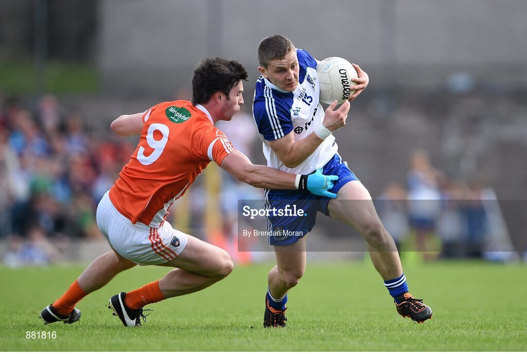 28 June 2014; Dermot Malone, Monaghan, in action against Aaron Findon, Armagh. Ulster GAA Football Senior Championship, Semi-Final, Armagh v Monaghan, St Tiernach's Park, Clones, Co. Monaghan. Picture credit: Brendan Moran / SPORTSFILE