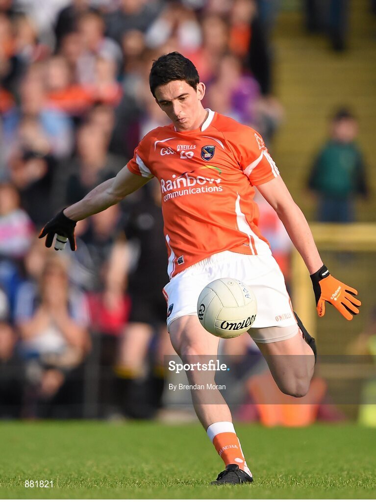 28 June 2014; Rory Grugan, Armagh, kicks a point from a free in the last seconds to equalise the game and send it to a replay. Ulster GAA Football Senior Championship, Semi-Final, Armagh v Monaghan, St Tiernach's Park, Clones, Co. Monaghan. Picture credit: Brendan Moran / SPORTSFILE