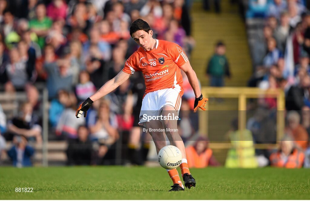 28 June 2014; Rory Grugan, Armagh, kicks a point from a free in the last seconds to equalise the game and send it to a replay. Ulster GAA Football Senior Championship, Semi-Final, Armagh v Monaghan, St Tiernach's Park, Clones, Co. Monaghan. Picture credit: Brendan Moran / SPORTSFILE