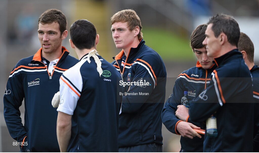 28 June 2014; Suspended Armagh players Brendan Donaghy, left, Kieran Toner, 3rd from left, and Andy Mallon, right, before the game. Ulster GAA Football Senior Championship, Semi-Final, Armagh v Monaghan, St Tiernach's Park, Clones, Co. Monaghan. Picture credit: Brendan Moran / SPORTSFILE