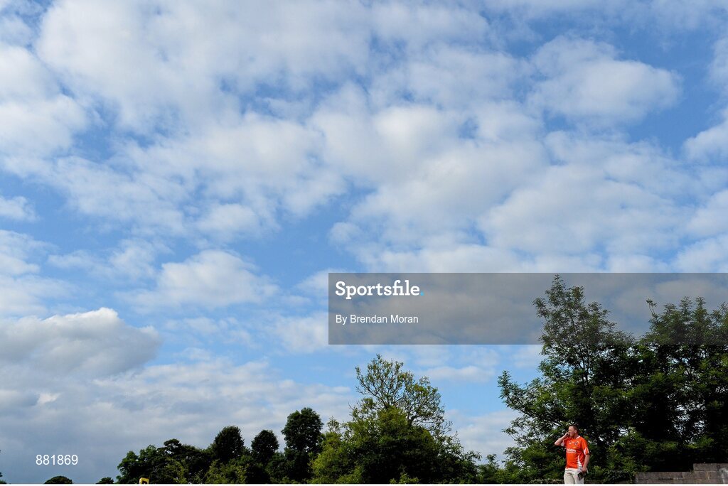 28 June 2014; An Armagh supporter makes a phone call before the game. Ulster GAA Football Senior Championship, Semi-Final, Armagh v Monaghan, St Tiernach's Park, Clones, Co. Monaghan. Picture credit: Brendan Moran / SPORTSFILE