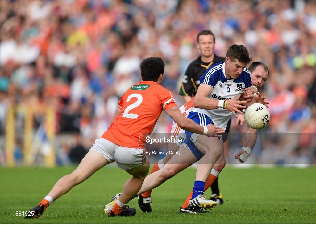 28 June 2014; Darren Hughes, Monaghan, in action against James Morgan, left, and Ciaran McKeever, Armagh. Ulster GAA Football Senior Championship, Semi-Final, Armagh v Monaghan, St Tiernach's Park, Clones, Co. Monaghan. Picture credit: Ramsey Cardy / SPORTSFILE