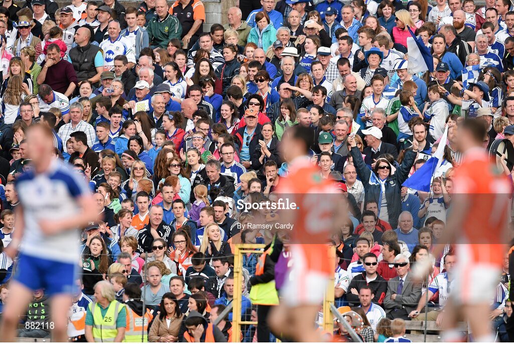 28 June 2014; Supporters watch on during the match. Ulster GAA Football Senior Championship, Semi-Final, Armagh v Monaghan, St Tiernach's Park, Clones, Co. Monaghan. Picture credit: Ramsey Cardy / SPORTSFILE