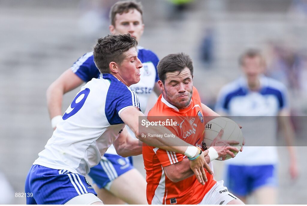 28 June 2014; Eugene McVerry, Armagh, in action against Darren Hughes, Monaghan. Ulster GAA Football Senior Championship, Semi-Final, Armagh v Monaghan, St Tiernach's Park, Clones, Co. Monaghan. Picture credit: Ramsey Cardy / SPORTSFILE