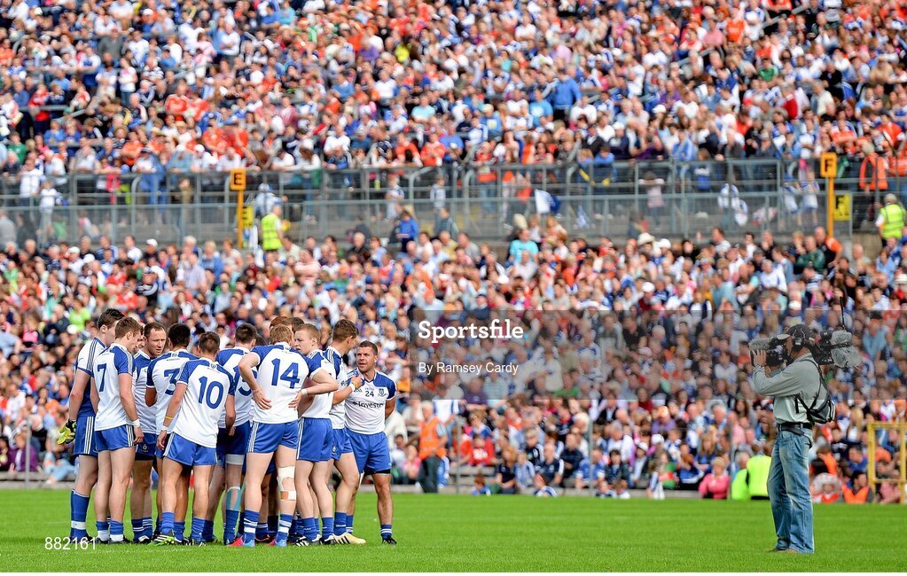 28 June 2014; Sky Sports TV cameras film the Monaghan team huddle before the match. Ulster GAA Football Senior Championship, Semi-Final, Armagh v Monaghan, St Tiernach's Park, Clones, Co. Monaghan. Picture credit: Ramsey Cardy / SPORTSFILE