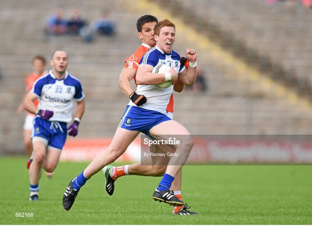 28 June 2014; Kieran Duffy, Monaghan, in action against Stephen Harold, Armagh. Ulster GAA Football Senior Championship, Semi-Final, Armagh v Monaghan, St Tiernach's Park, Clones, Co. Monaghan. Picture credit: Ramsey Cardy / SPORTSFILE