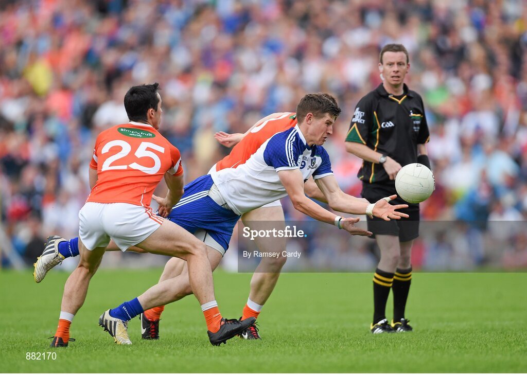 28 June 2014; Darren Hughes, Monaghan, in action against Aaron Kernan, left, and Charlie Vernon, Armagh. Ulster GAA Football Senior Championship, Semi-Final, Armagh v Monaghan, St Tiernach's Park, Clones, Co. Monaghan. Picture credit: Ramsey Cardy / SPORTSFILE
