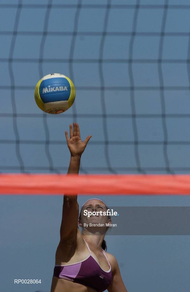 15 July 2006; Miriam Gormally serves against Doireann Counihan and Jen Walsh. Coca-Cola Bray Beach Volleyball Event, Sand Area, Women's Round Robin, Dunne / Gormally  v Counihan / J. Walsh, Bray Beach, Bray, Co. Wicklow. Picture credit: Brendan Moran / SPORTSFILE