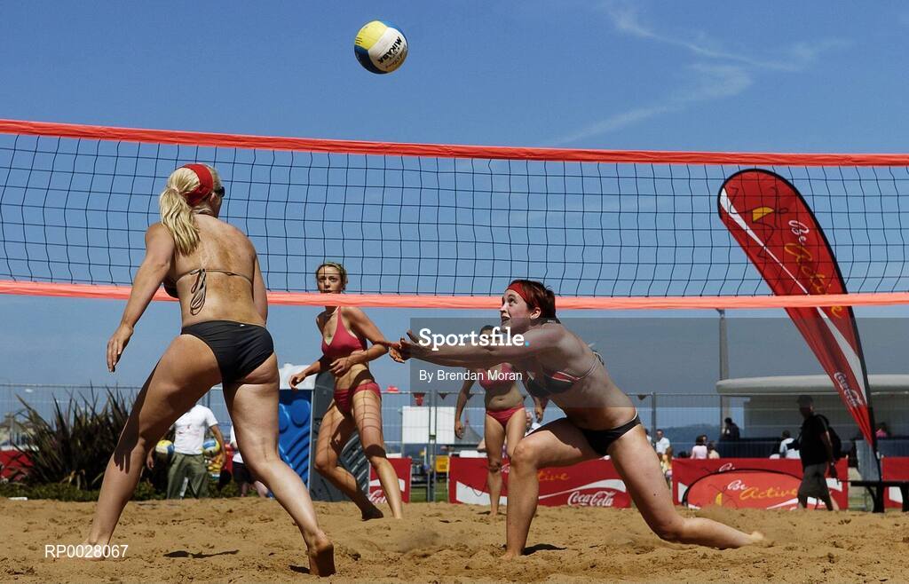 15 July 2006; Pauline Walsh sets up team-mate Leanne Dignam against Doireann Counihan and Jen Walsh. Coca-Cola Bray Beach Volleyball Event, Sand Area, Women's Round Robin, Dignam / P. Walsh v Counihan / J. Walsh, Bray Beach, Bray, Co. Wicklow. Picture credit: Brendan Moran / SPORTSFILE
