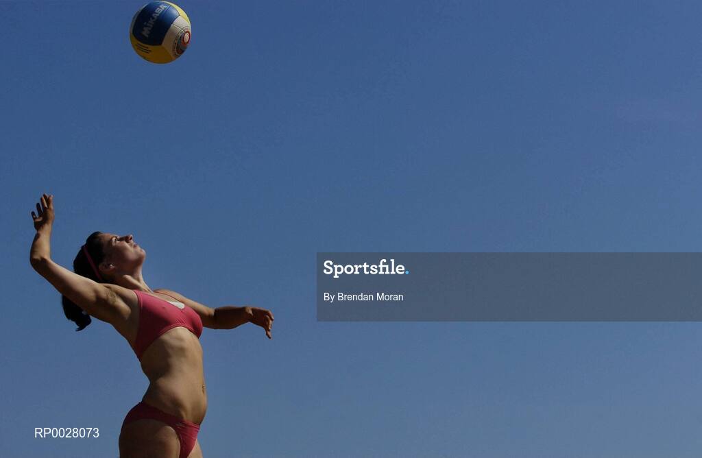 15 July 2006; Doireann Counihan serves to Eleanor Dunne and Miriam Gormally during their match. Coca-Cola Bray Beach Volleyball Event, Sand Area, Women's Round Robin, Dunne / Gormally v Counihan / J. Walsh, Bray Beach, Bray, Co. Wicklow. Picture credit: Brendan Moran / SPORTSFILE
