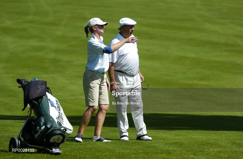 17 July 2006; Jude Byrne, Rathbane Golf Club, Limerick, and Munster, consults with Christy O'Connor Jnr on the 16th fairway. AIB Christy O'Connor Jnr Challenge Final, Leinster v Munster, The K Club, Straffan, Co. Kildare. Picture credit: Brendan Moran / SPORTSFILE