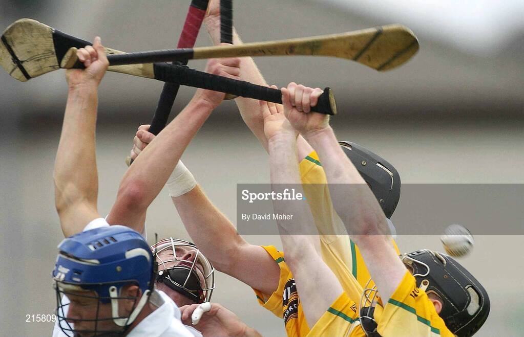 23 July 2006; Martin Scullion and Karl McKeegan, Antrim, in action against Billy white and Donal Moloney, Kildare. Christy Ring Cup Semi-Final, Kildare v Antrim, Cusack Park, Mullingar, Co. Westmeath. Picture credit: David Maher / SPORTSFILE
