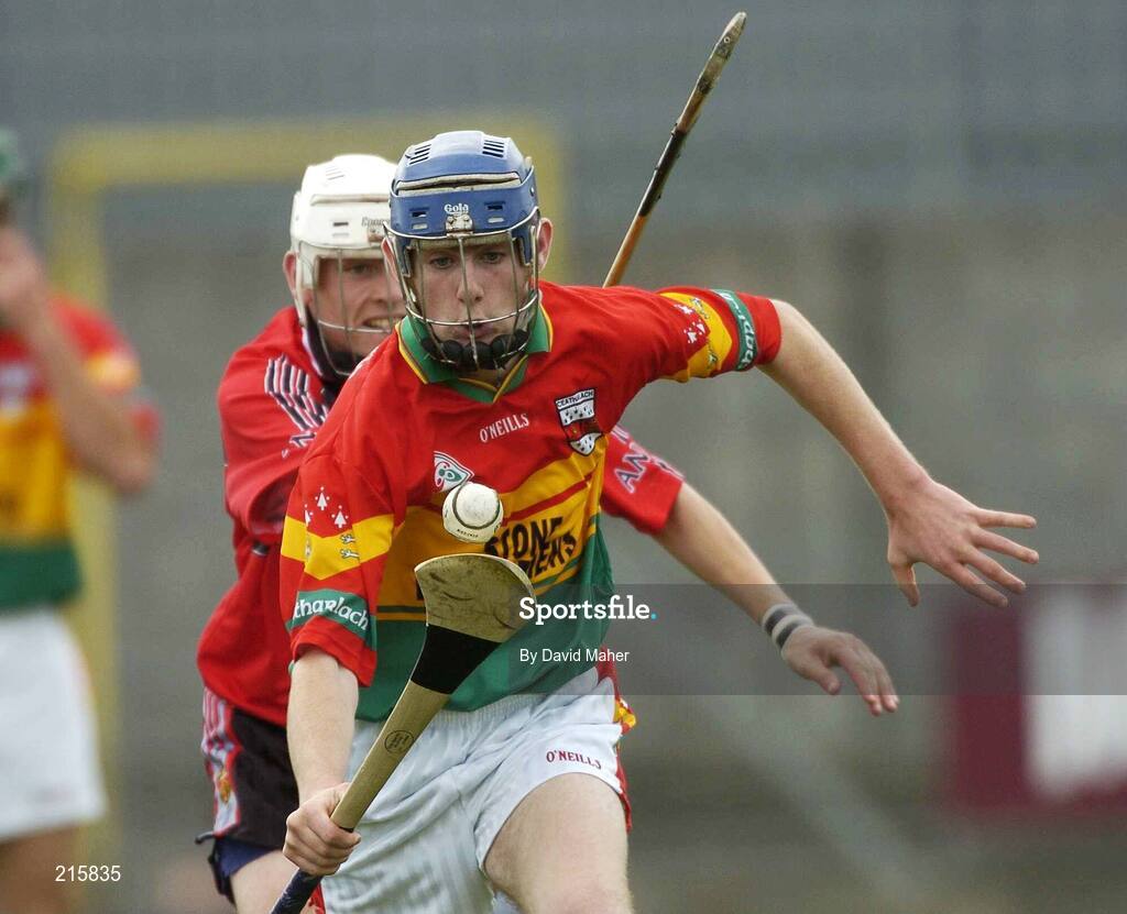 23 July 2006; Eoin Nolan, Carlow, in action against Stephen Clarke, Down. Christy Ring Cup Semi-Final, Down v Carlow, Cusack Park, Mullingar, Co. Westmeath. Picture credit: David Maher / SPORTSFILE