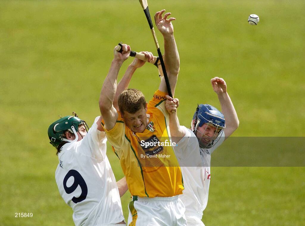 23 July 2006; Malachy Molloy, Antrim, in action against Paul Divilly, left, and Donal Moloney, Kildare. Christy Ring Cup Semi-Final, Kildare v Antrim, Cusack Park, Mullingar, Co. Westmeath. Picture credit: David Maher / SPORTSFILE