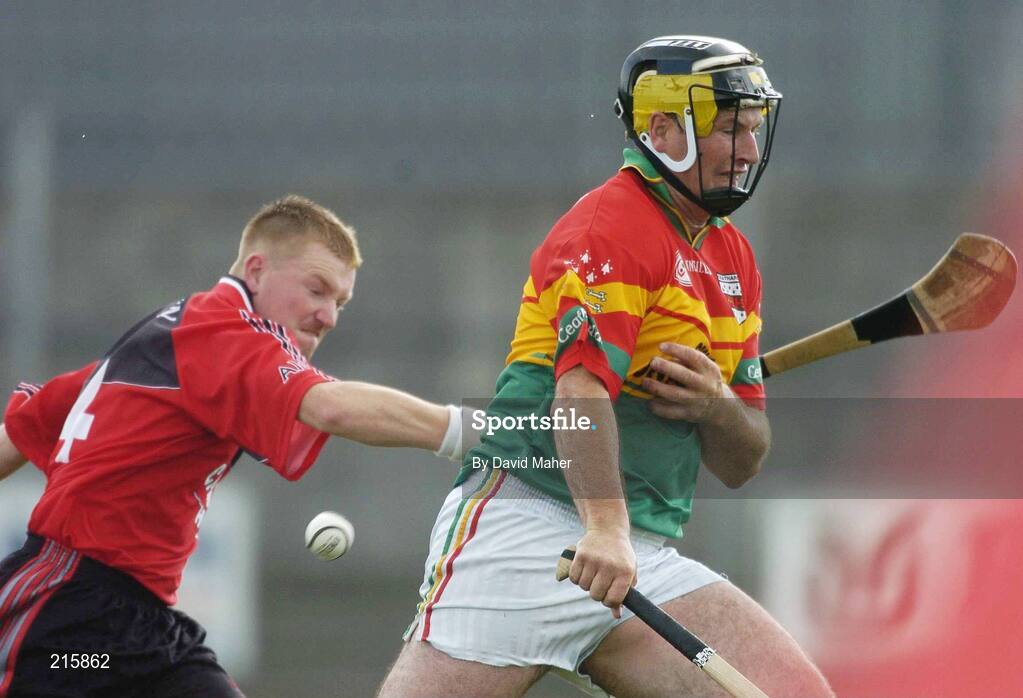 23 July 2006; Des Murphy , Carlow, in action against Seamus Roddy, Down. Christy Ring Cup Semi-Final, Down v Carlow, Cusack Park, Mullingar, Co. Westmeath. Picture credit: David Maher / SPORTSFILE