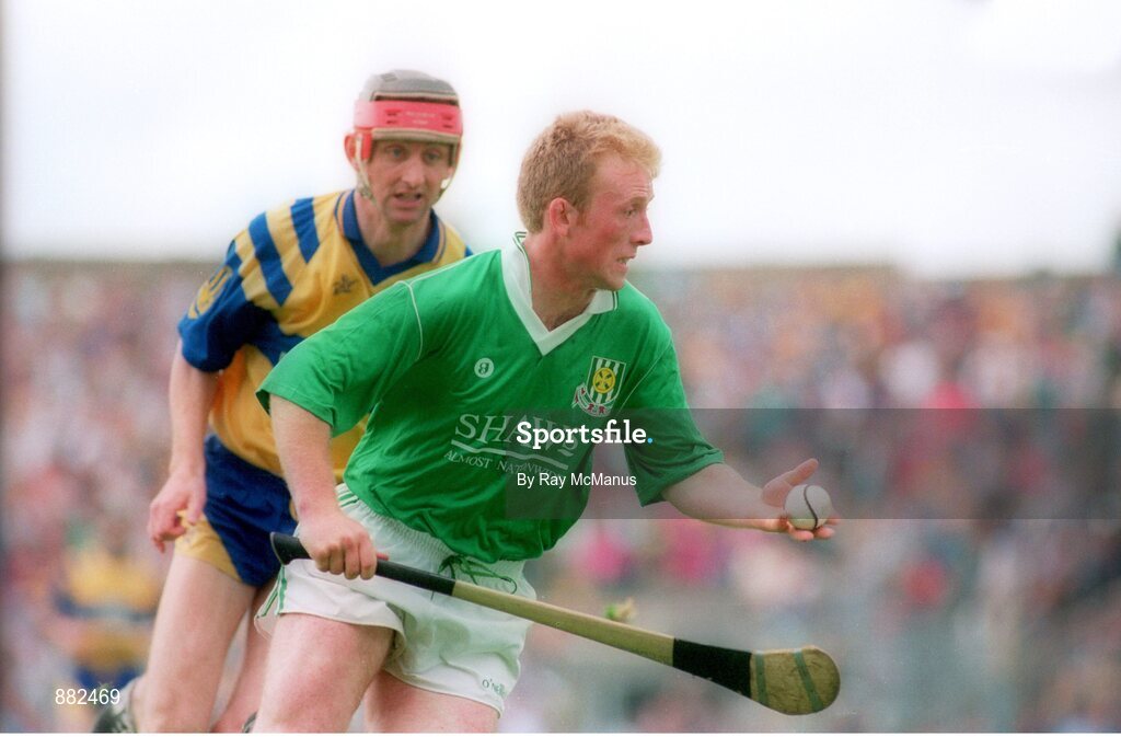 10 July 1994; Dave Clarke, Limerick, in action against Cyril Lyons, Clare. Munster Senior Hurling Final, Limerick v Clare, Semple Stadium, Thurles, Co. Tipperary. Picture credit: Ray McManus / SPORTSFILE