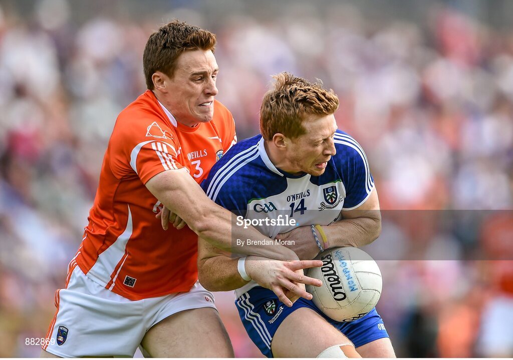 28 June 2014; Kieran Hughes, Monaghan, in action against Charlie Vernon, Armagh. Ulster GAA Football Senior Championship, Semi-Final, Armagh v Monaghan, St Tiernach's Park, Clones, Co. Monaghan. Picture credit: Brendan Moran / SPORTSFILE