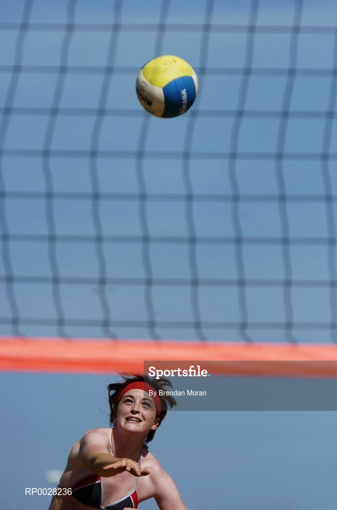 15 July 2006; Pauline Walsh serves to Noya Kuncik and Ollie Rossiter. Coca-Cola Bray Beach Volleyball Event, Sand Area, Women's Round Robin, Dignam / P. Walsh v Kuncik / Rossiter, Bray Beach, Bray, Co. Wicklow. Picture credit: Brendan Moran / SPORTSFILE